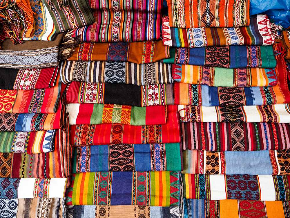Colourful Textiles in Pisac Market near Cusco, Peru