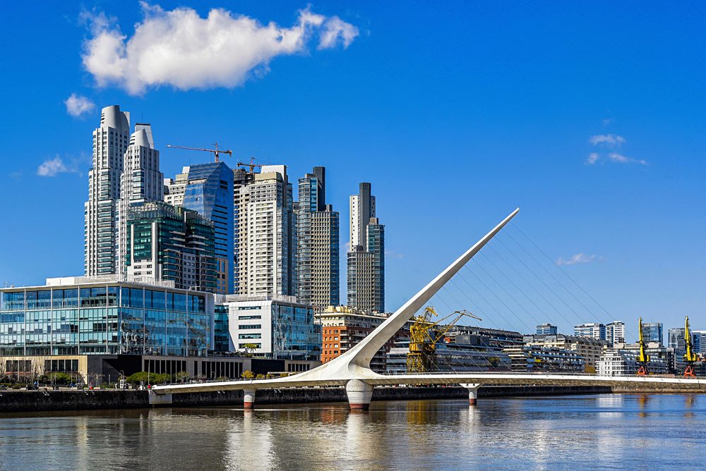 Daytime view at the waterfront in Puerto Madero with the Puente de la Mujer, Buenos Aires, Argentina