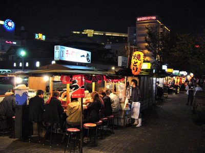 Fukuoka's famous food stalls (yatai) located along the river on Nakasu Island, Kyushu, Japan