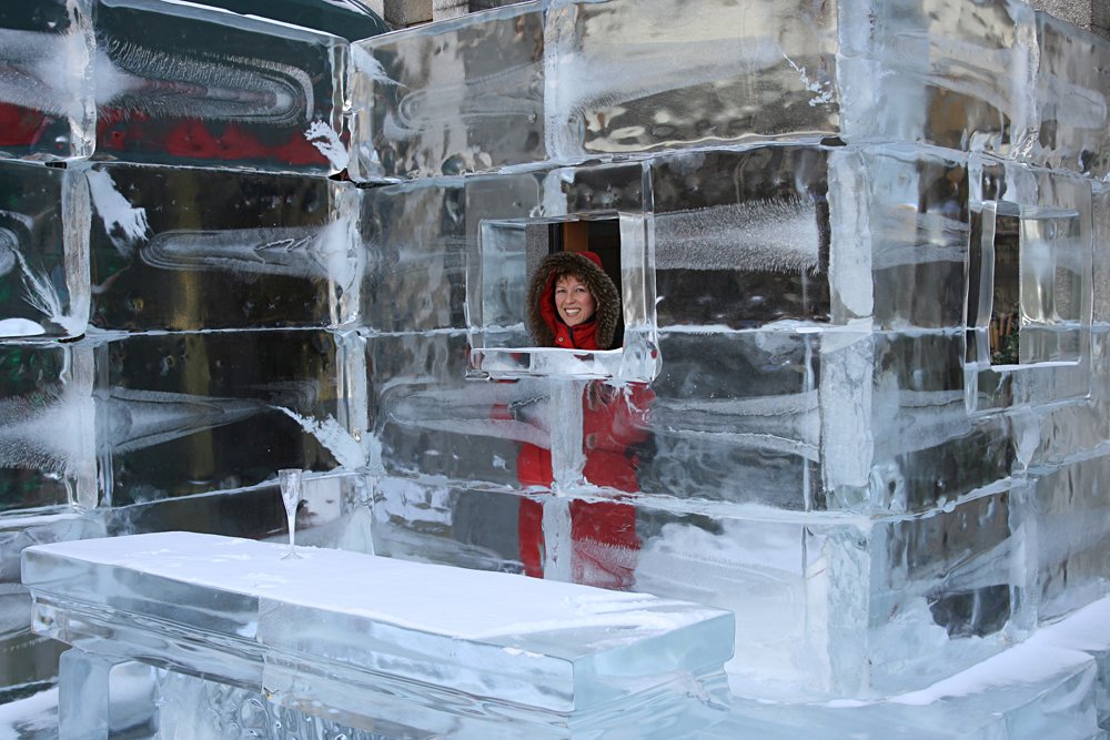 Woman at the bar of an ice hotel, Europe