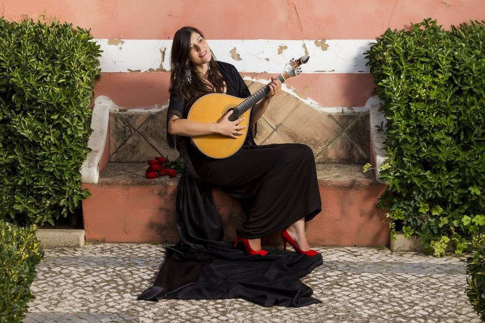 Woman performing traditional Portuguese Fado music, Portugal