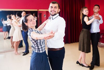 Young people dancing together at a Milonga, Argentina