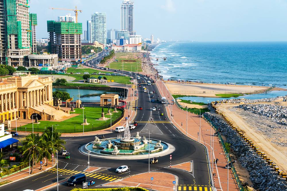 Aerial view of Colombo and coastal promenade, with construction of modern buildings, Sri Lanka