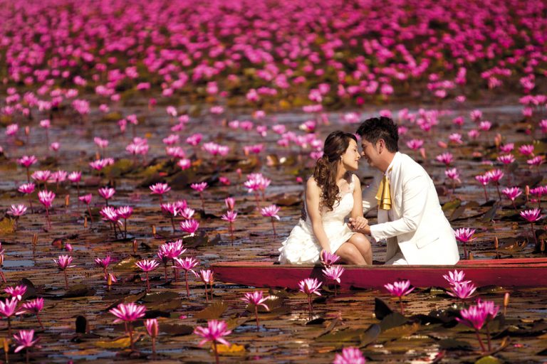 Thale Bua Dang or Red Lotus Sea, Nong Han Lake, Udon Thani, Published in Million of Red Lotuses Blossom at Nong Han. Kumphawapi, Osotho Magazine, Issued : February, 2012