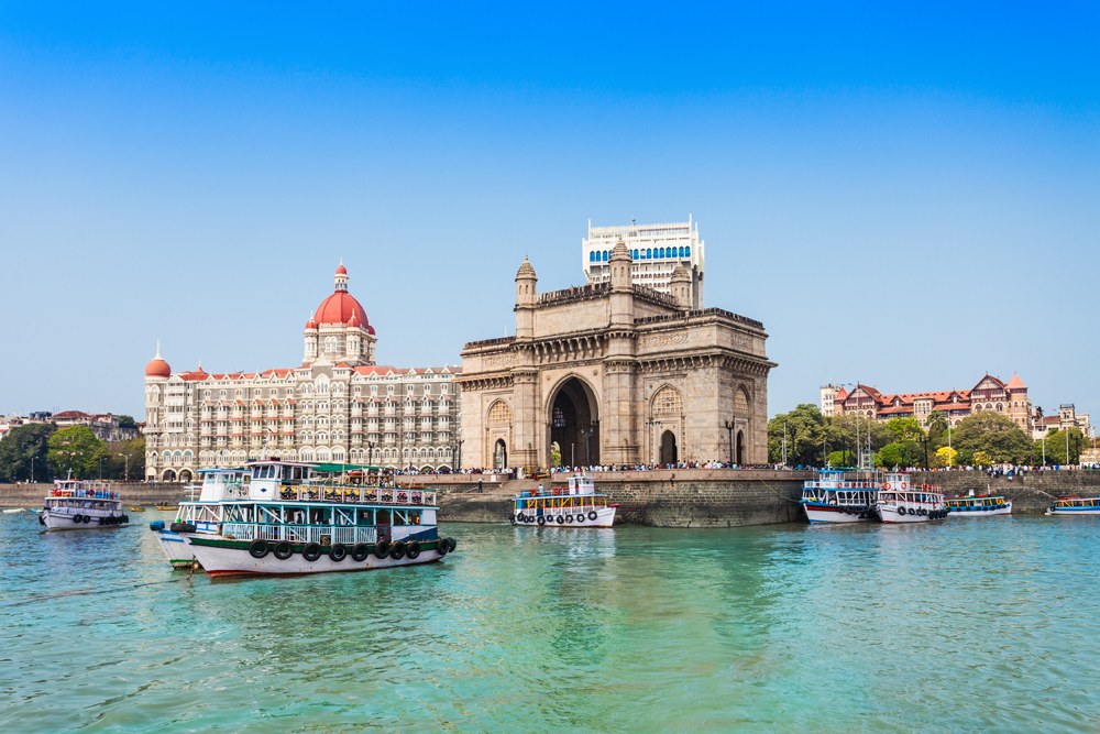 Gateway of India and boats, plus the famous Taj Hotel, Mumbai, India