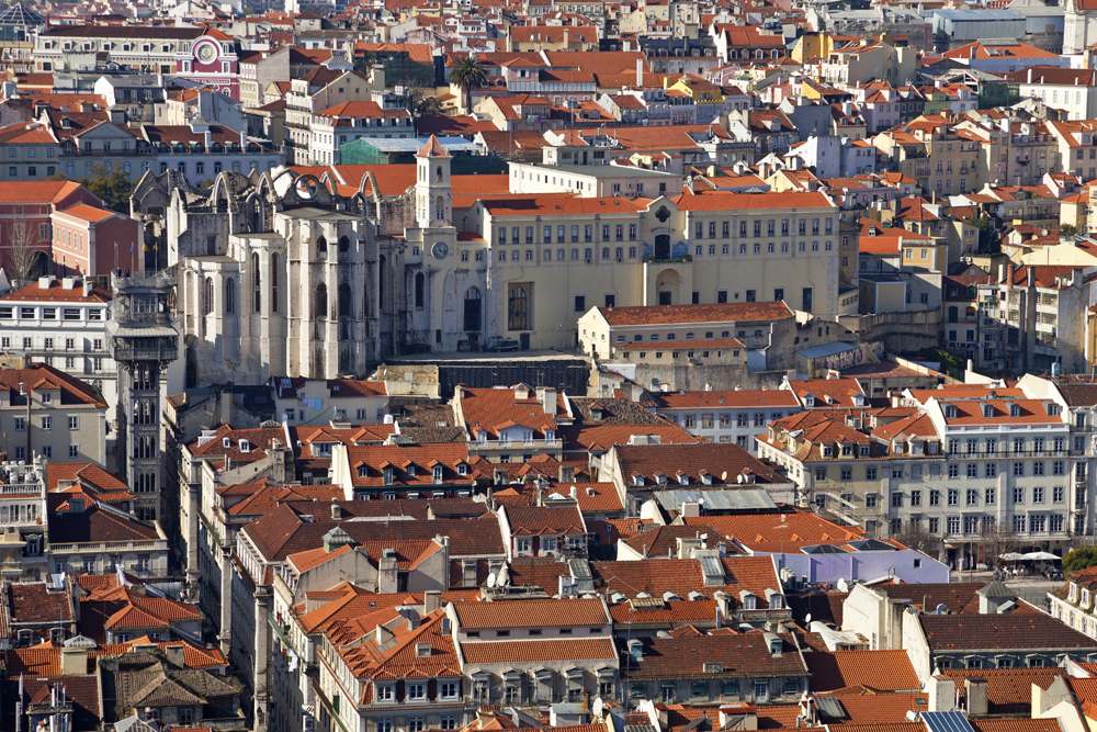 Carmo Convent, Santa Justa Elevator and rooftops of the historical Bairra District of Lisbon, Portugal 