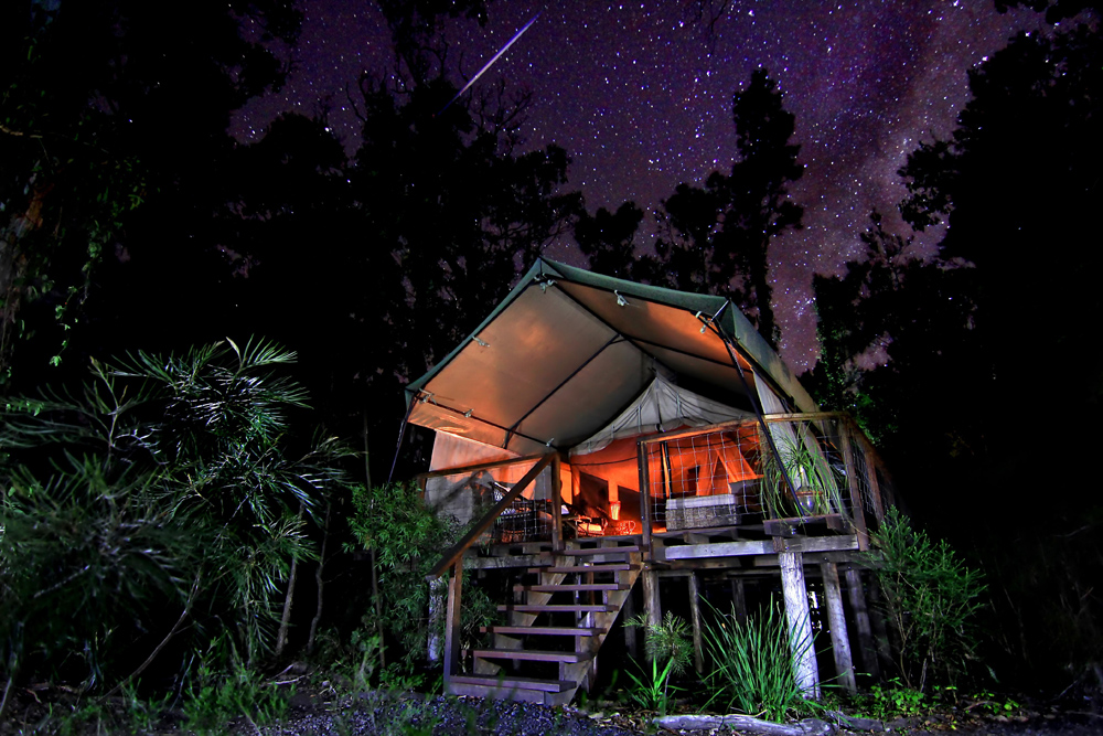 Janie Robinson - Paperbark Camp safari tent beneath a starry sky, New South Wales, Australia