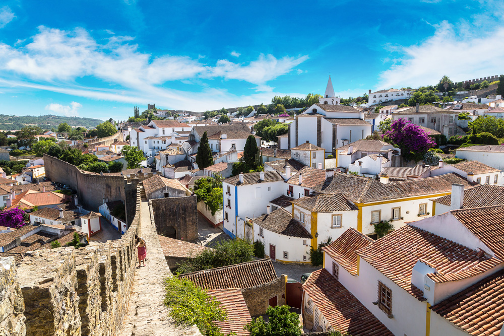 Aerial view of medieval town Obidos in a beautiful summer day, Portugal 