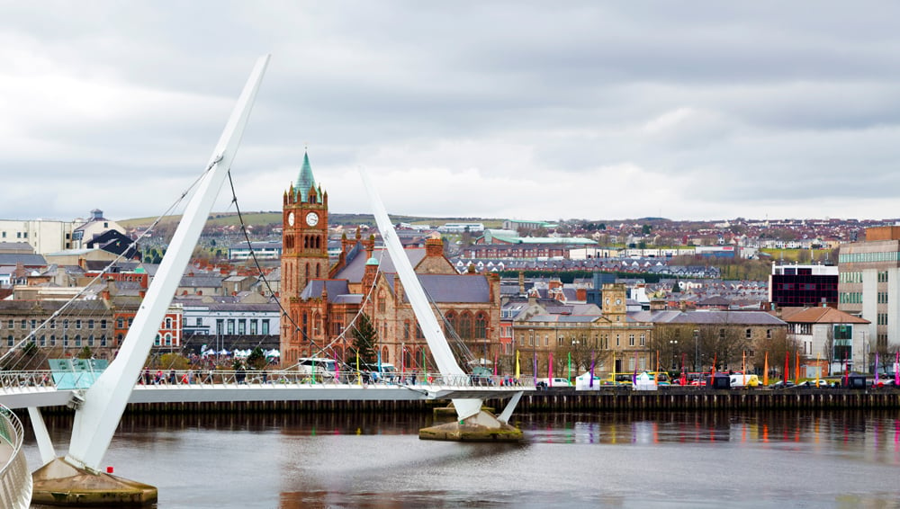 Peace Bridge over the River Foyle and Guildhall, Derry (Londonderry), Northern Ireland 