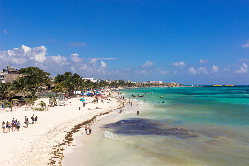 White sand beach and turquoise waters of Playa del Carmen, Mexico 