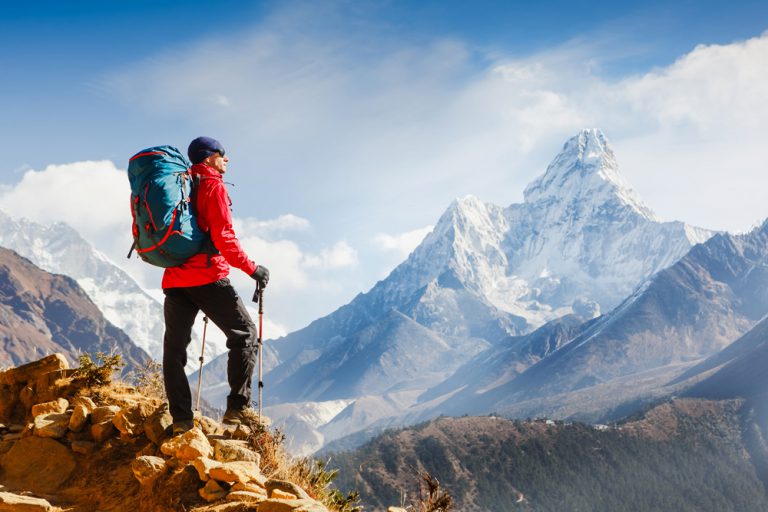 Active hiker enjoying the view of the Himalayas, Nepal