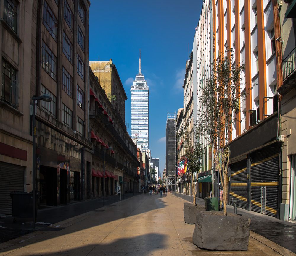 Pedestrian street downtown with Torre Latinoamericana in background, Mexico City, Mexico 