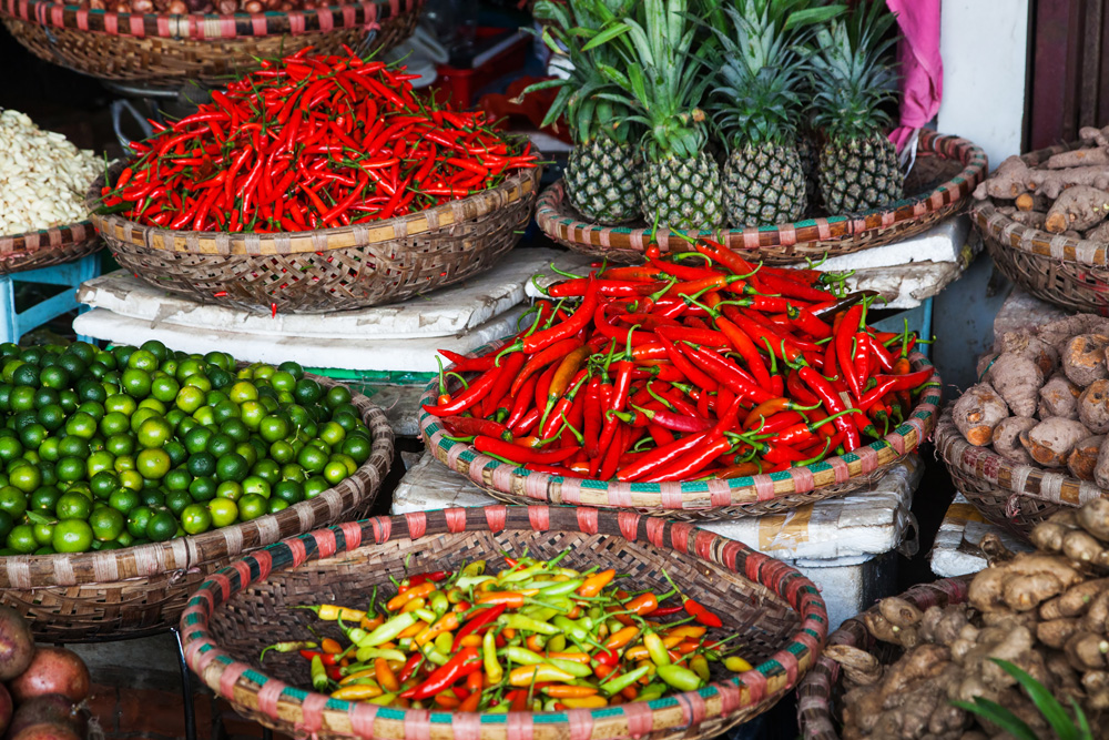 Tropical spices and fruits sold at Dong Xuan Market in Hanoi, Vietnam 