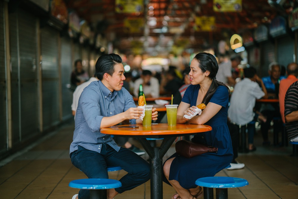 Enjoying a snack at a hawker centre, Singapore 