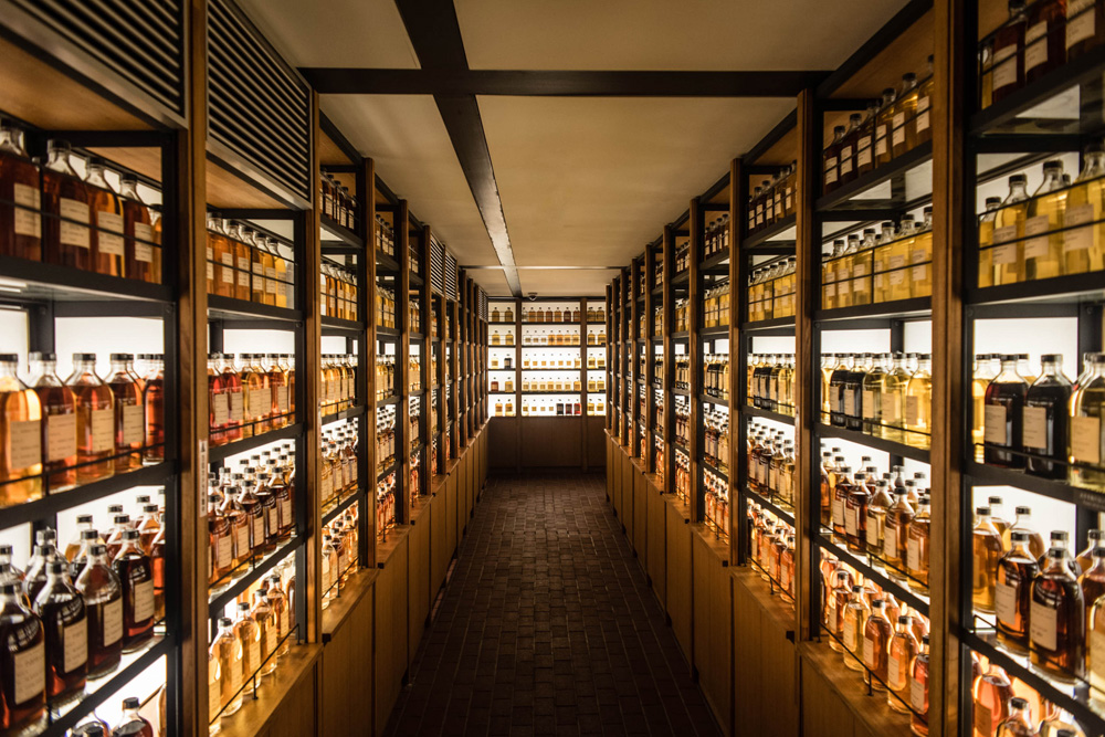 Room full of whisky cabinets storing different types of whisky 