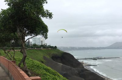 Aren Bergstrom - Paragliding Off Cliffs of Miraflores, Lima, Peru - Cropped