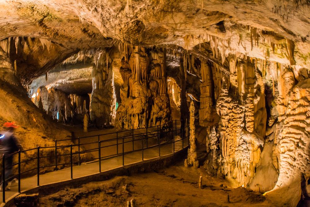 Beautiful view of stalactites and stalagmites in an underground cavern, Postojna Cave, Slovenia 
