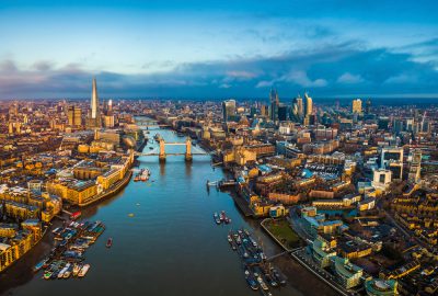 Aerial skyline view of London along the Thames at sunset, England UK United Kingdom