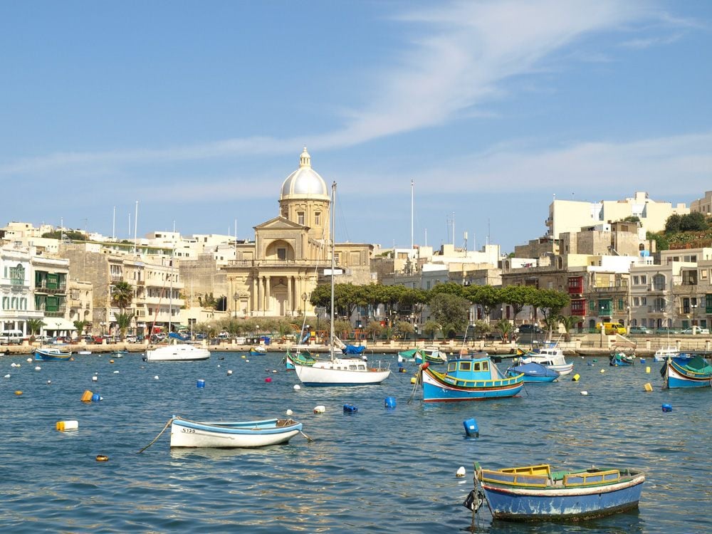 Scenic view of Kalkara Creek marina across the water from Vittoriosa Birgu, The Three Cities, Valletta, Malta 