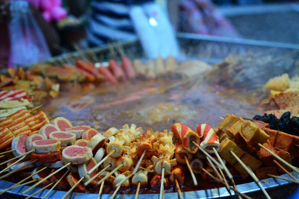 Uyghur delicacies at Kashgar Night Market, Xinjiang, China 