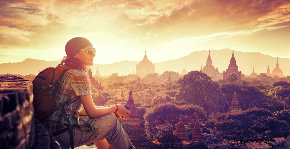 Young backpacker enjoying the view at sunset in Bagan, Myanmar 