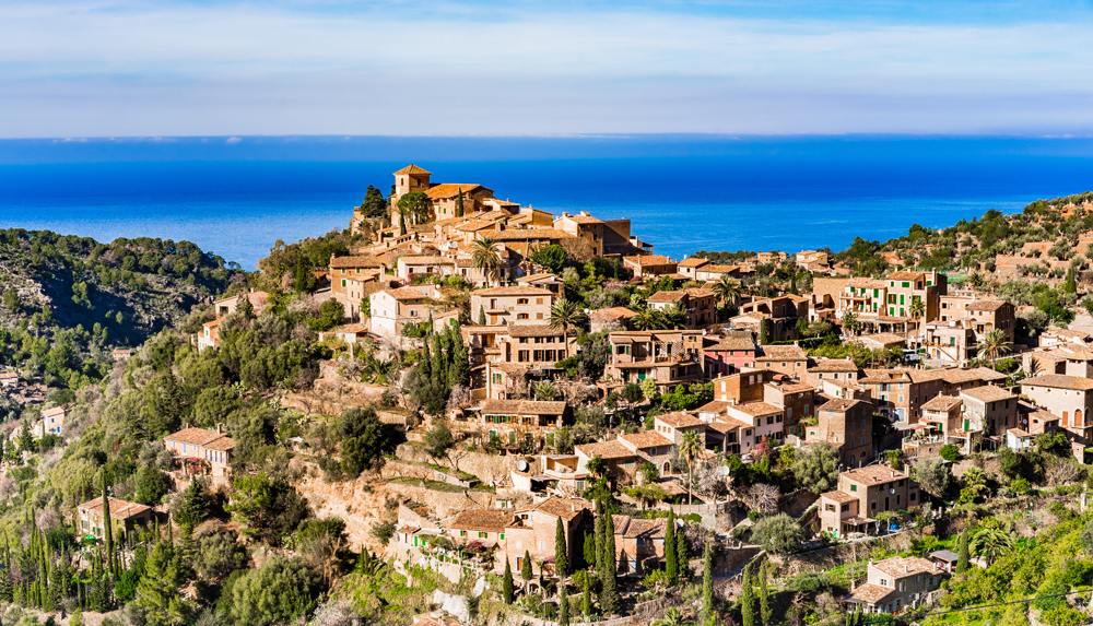 Beautiful view of the old Mediterranean mountain village of Deia, Majorca, Balearic Islands, Spain 