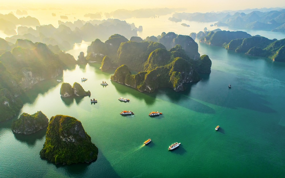 Aerial view of floating fishing village and rock island, Halong Bay, Vietnam