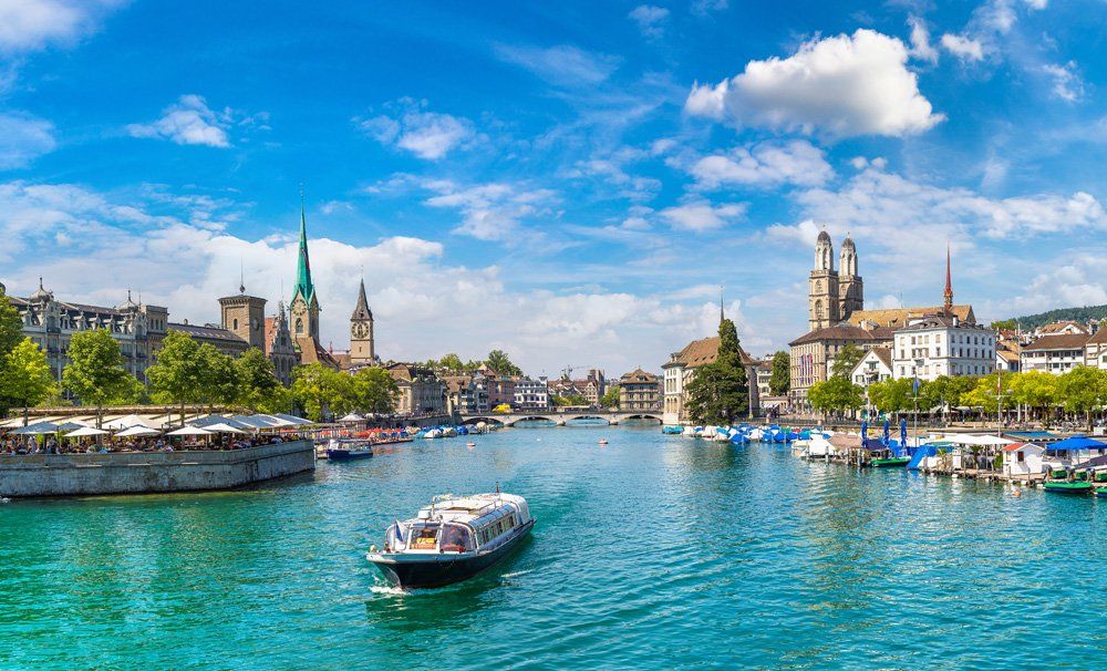 Historical part of Zurich with famous Fraumunster and Grossmunster churches on a beautiful summer day, Switzerland