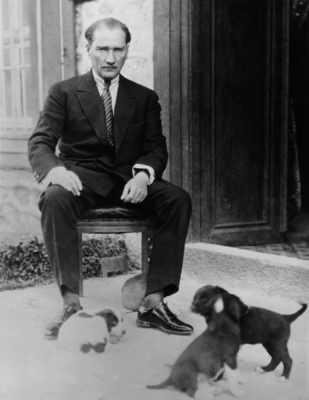 Photo of Mustafa Kemal Ataturk with his pet dogs, ca 1930, Turkey 