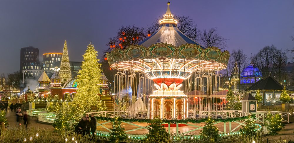 Carousel and Christmas illumination in Tivoli Gardens, Copenhagen, Denmark 