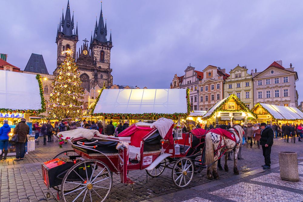 Horse and carriage at Christmas market in Old Town Square, Prague, Czech Republic 