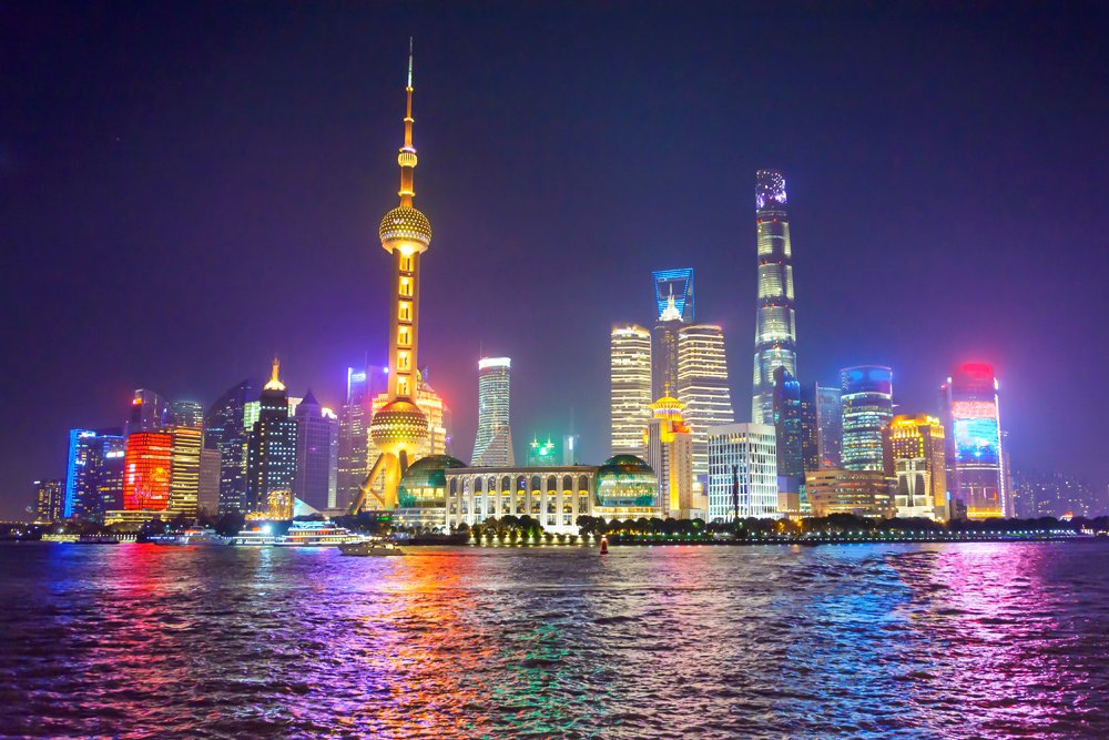 Night view of Illuminated Shanghai skyline and Huangpu River at night, China 