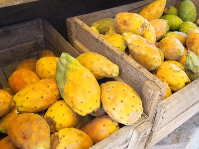 Prickly pear cactus fruit in crate in Peru market 