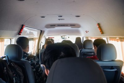 Inside a minivan in Thailand with group of tourists