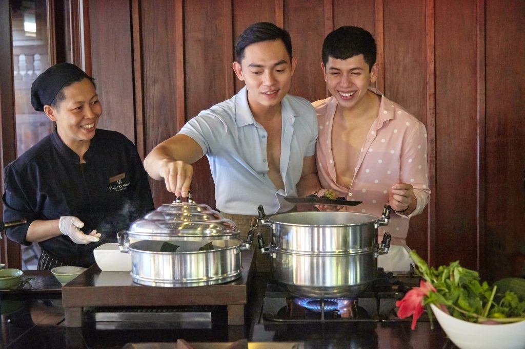 Male couple taking a cooking class