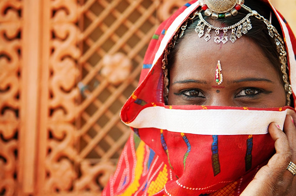 Indian Woman Covering Half Face With Sari, India