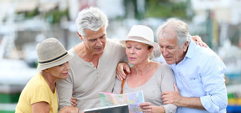 Senior Tourists Using Tablet on Visiting Journey